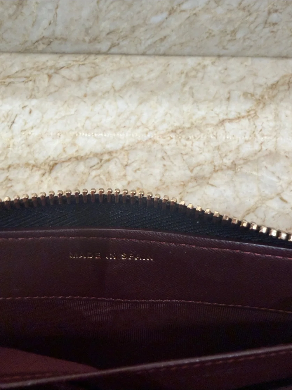 CHANEL Black Quilted Zip-Around Wallet with Gold CC